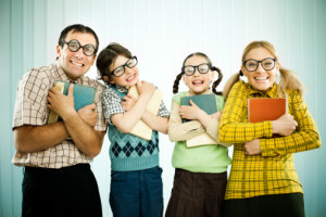 143919053-nerd-family-holding-their-books-and-looking-gettyimages