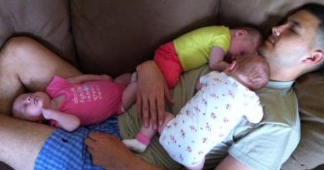 triplets-sleeping-on-dad-e1339528811296